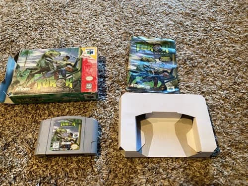 Turok: Dinosaur Hunter N64 CIB with box, manual, and plastic protector sleeve