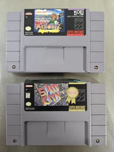 Nintendo SNES Cartridges Aerobiz supersonic and Sim City (1991)