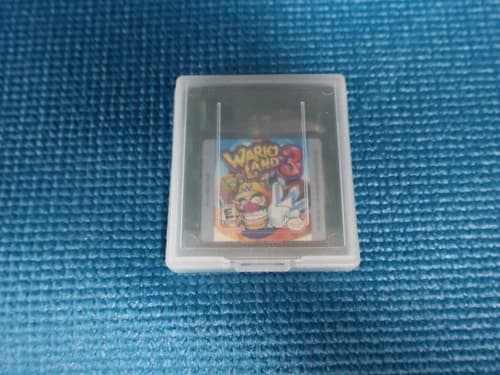 vintage copy of the video game Wario Land 3 for the Nintendo Game Boy Color