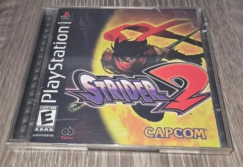 Strider 2 - (Sony PlayStation, 2000, 2 Disc) - CIB - Tested and Working