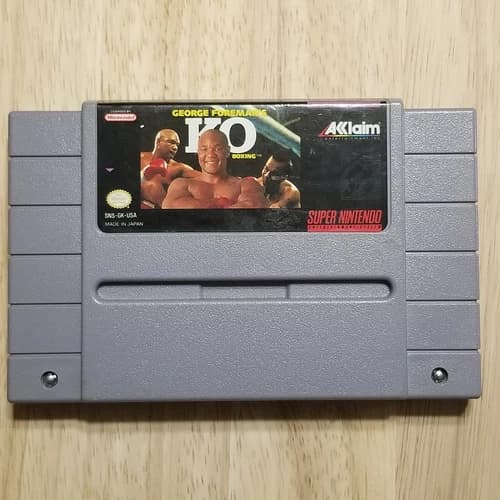 George Foreman's KO Boxing SNES Cartridge Authentic and works.