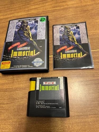 The Immortal (Sega Genesis) CIB complete video game formal rental weird case
