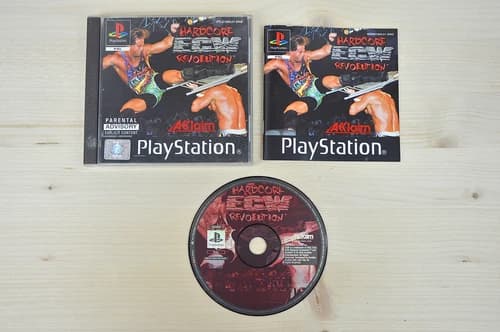PS1 - ECW Hardcore Revolution - (CIB, with manual)