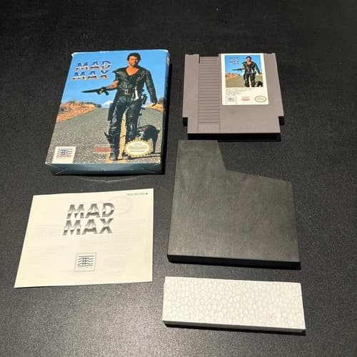 Mad Max Nintendo NES Complete Game with Box and Manual Plastic Sleeve Great Cond