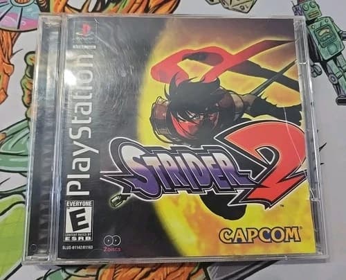 Strider 2 PS1 PlayStation 1 CIB 2 Discs Tested Working, With Reg Card