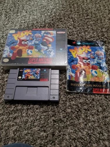 Plok - Super Nintendo SNES w/ manual, partial box, Universal Game Case