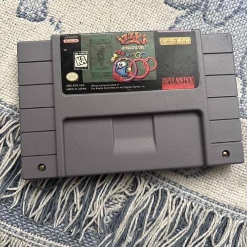 Izzy's Quest for the Olympic Rings Super Nintendo SNES