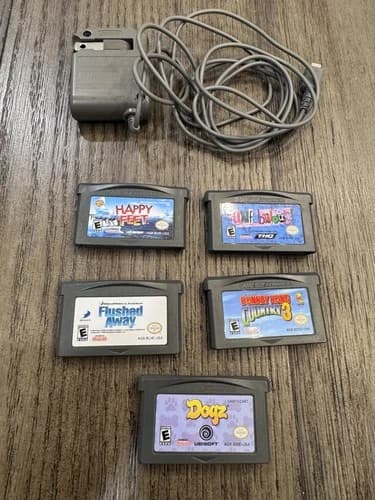 Gameboy advance Games With Charger, Donkey Kong Country 3, Happy Feet, Dogz