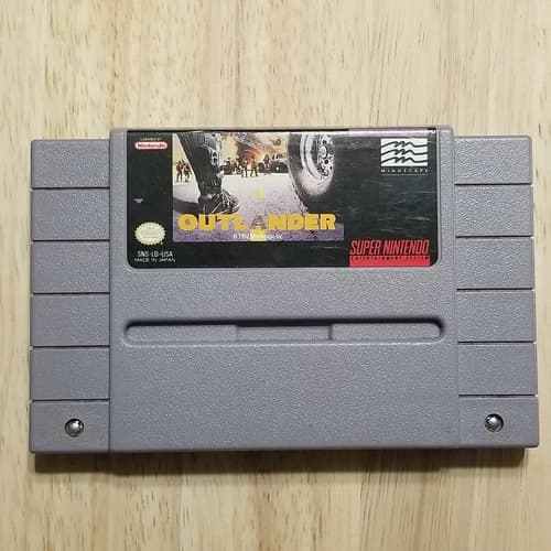 Outlander SNES Cartridge Authentic and works.